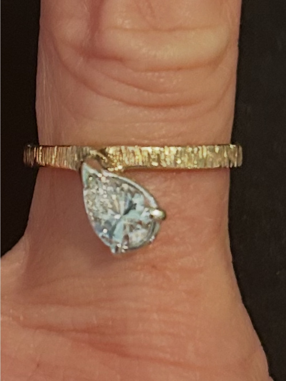 Textured Gold Band Ring with Pear-Shaped Diamond